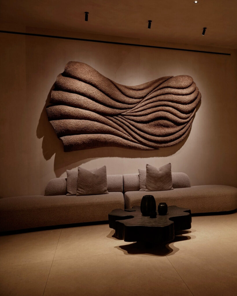 Textured sculptural installation in architectural entrance hall