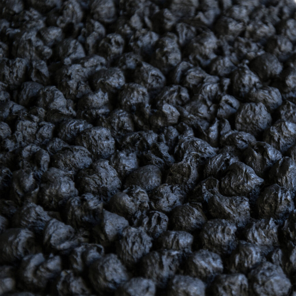 Repetitive sculptural textures exploring animal-inspired rhythms.