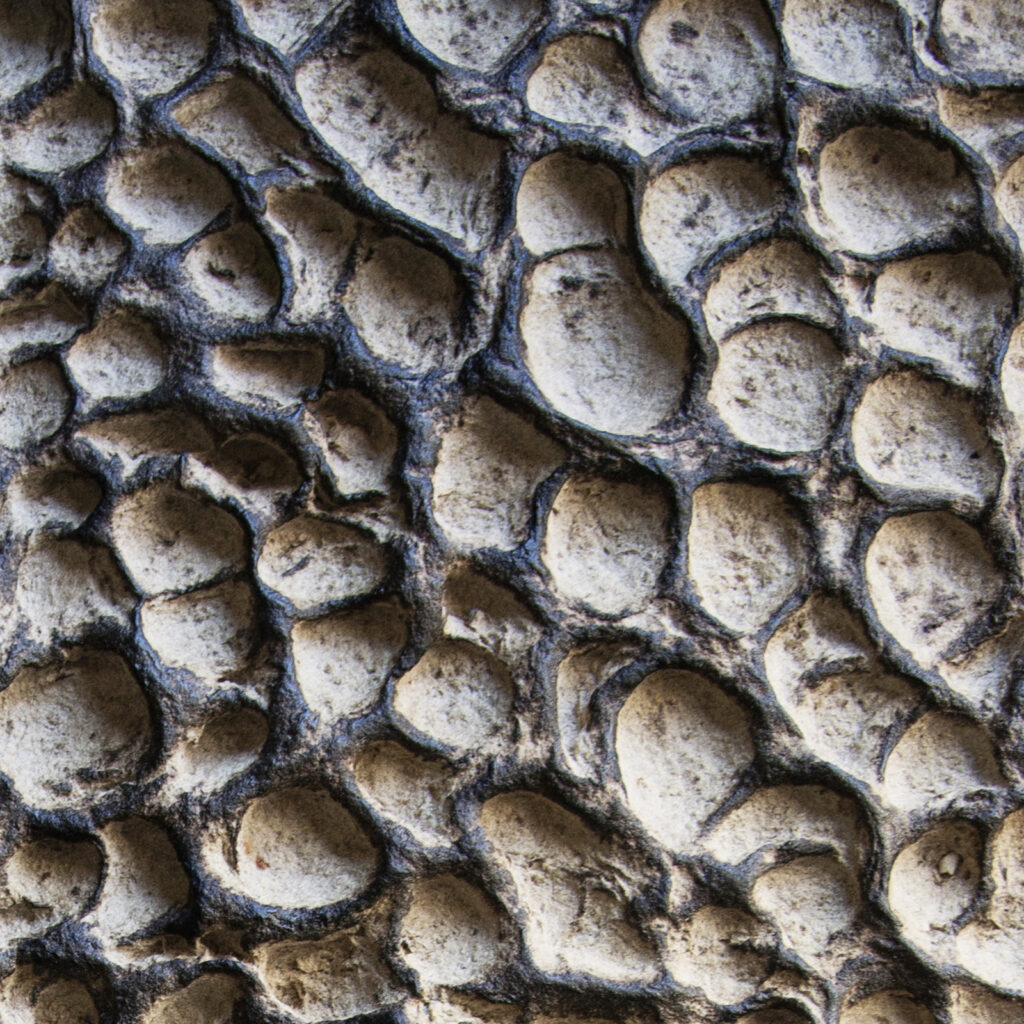 Organic sculptural relief inspired by fictional terrains.