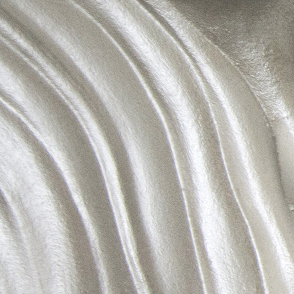 Flowing sculptural relief exploring movement and light