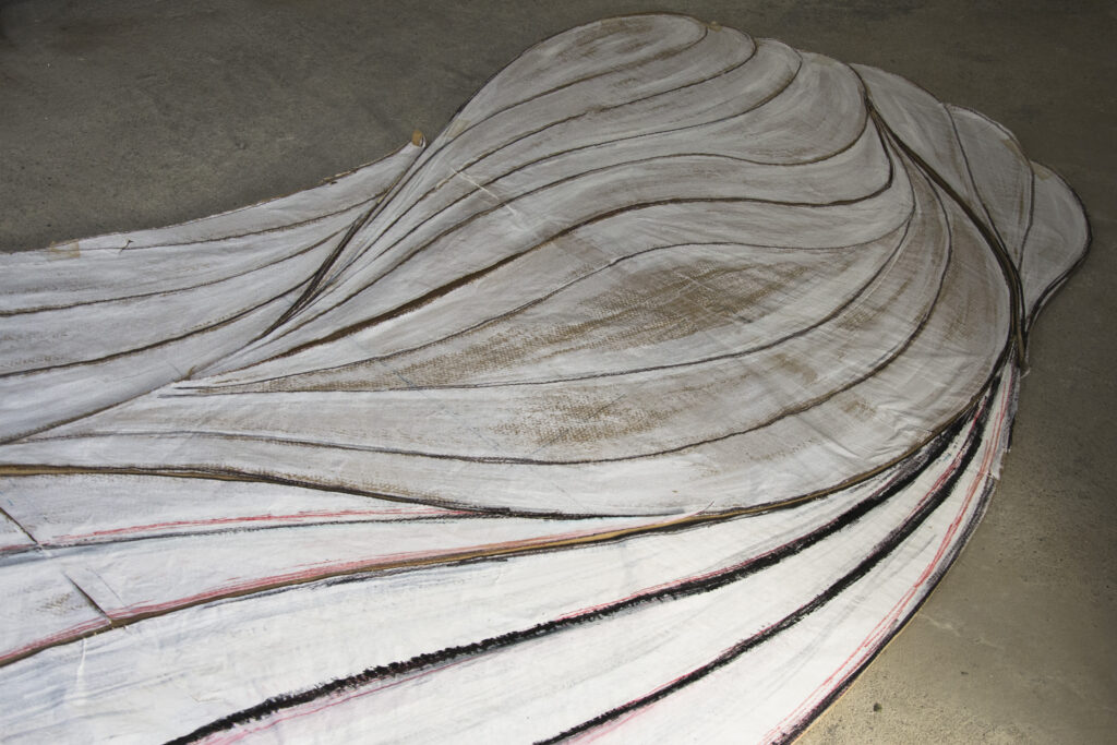 Sculptural wall installation conceived for a contemporary architectural interior.