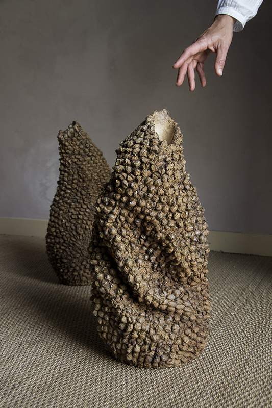 Autonomous sculptures shaping the perception of space through texture and relief.