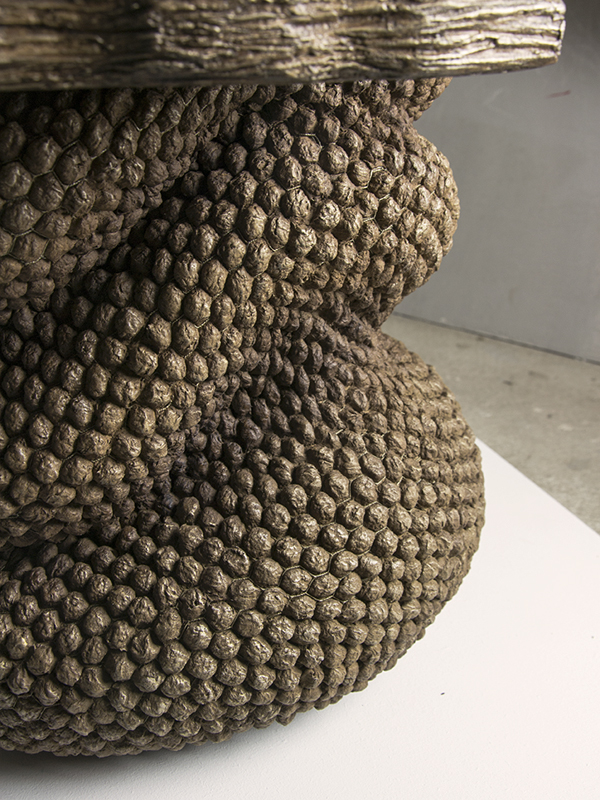 Repetitive sculptural textures exploring animal-inspired rhythms.