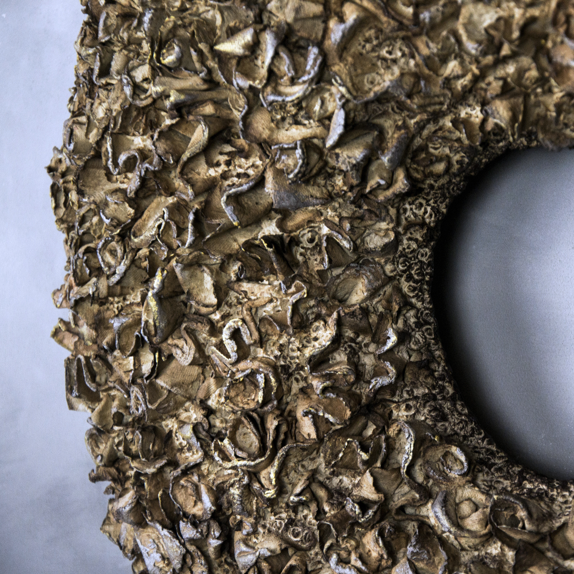 material texture exploring tactile relief and surface depth to create a sense of depth and immersion within the architectural space.