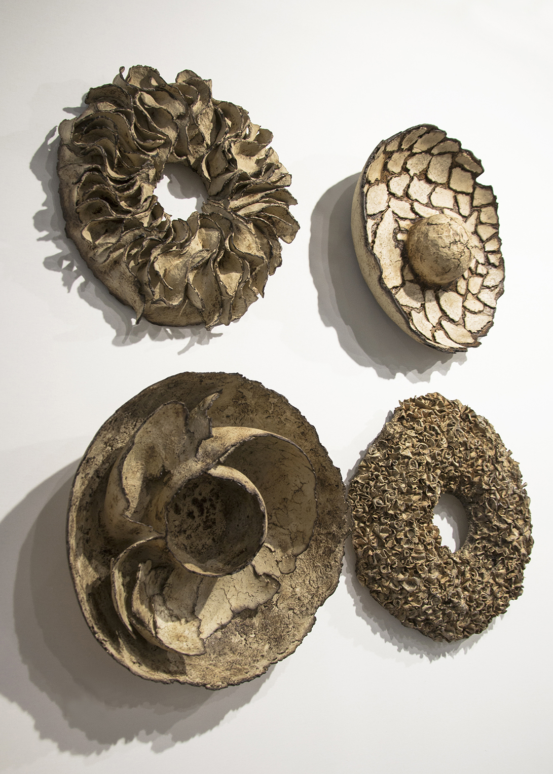 Sculptural installation creating a strong material presence within an architectural setting.